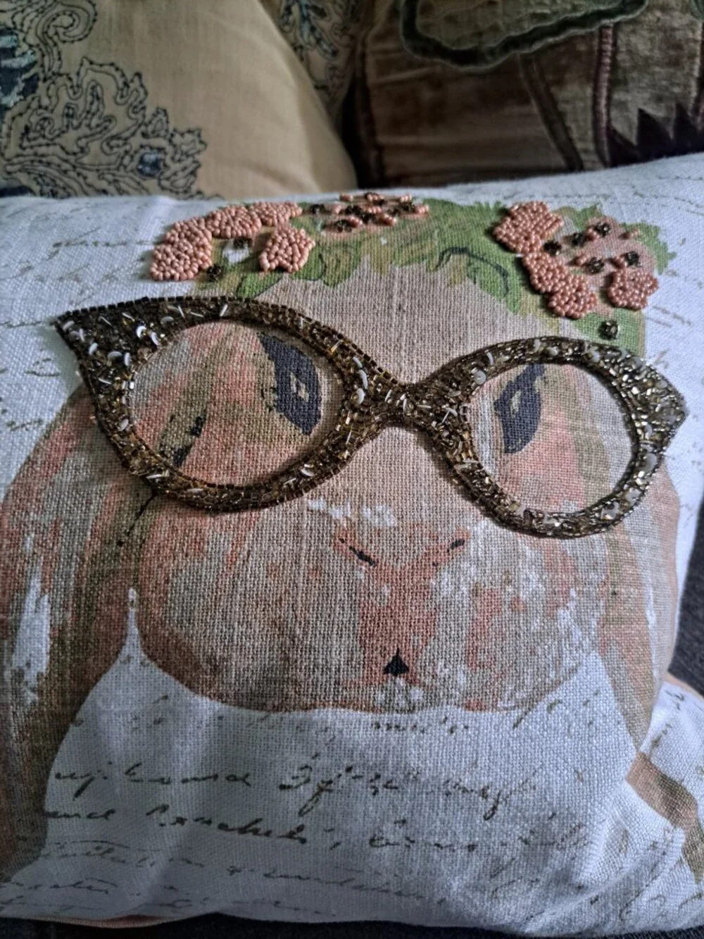 Whimsical rectangular throw pillow has a linen-like fabric base with a printed s